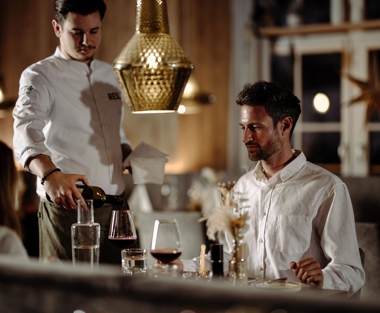 Genussvolles Abendessen im Restaurant 1774 des Reslwirt Flachau mit Service am Tisch